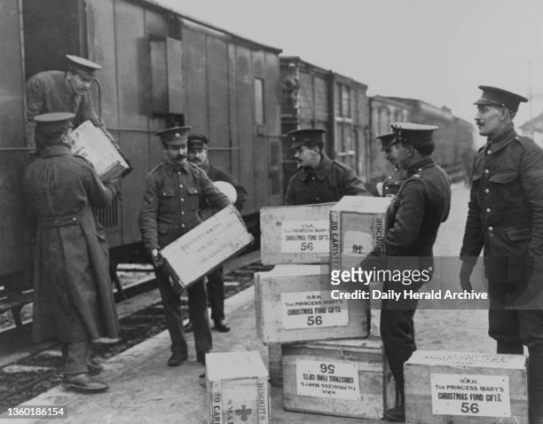 Princess Mary's Christmas fund gifts being unloaded at the front, Christmas 1914. The first Christmas of World War One was marked on the Western...