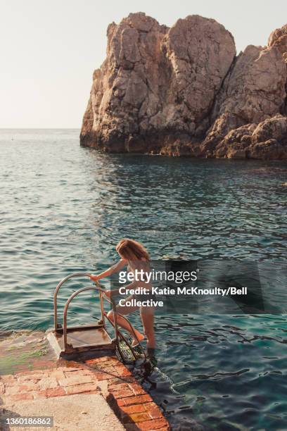 Girl Swimming at Lido del Faro, Capri