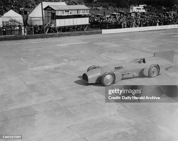 Sir Malcolm Campbell driving his motor car Bluebird, Brooklands racetrack, Weybridge, Surrey, 25 May 1931. Sir Malcolm Campbell , the English...