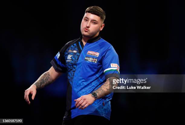 Lewy Williams of Wales in action during his Round One match against Toyokazu Shibata of Japan during Day Seven of The William Hill World Darts...