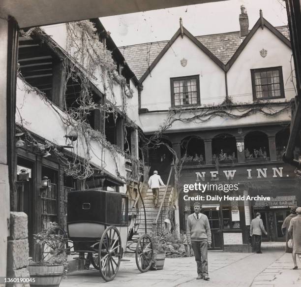 In Search of England with Anthony Carthew, 1961. Tony Carhew in the courtyard of the New Inn Gloucester ? it a pity that this 13th-century inn has...