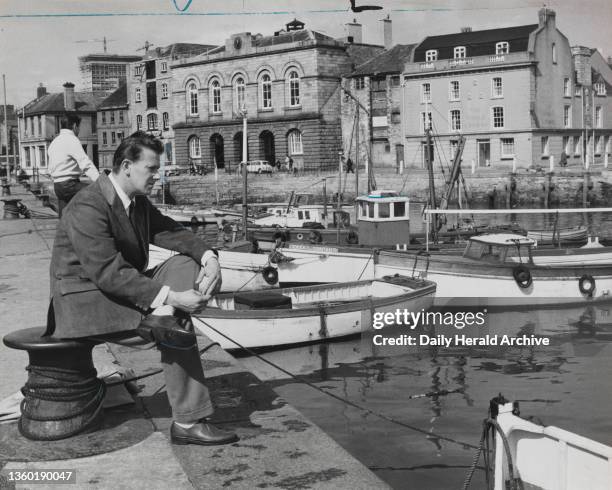 In Search of England , 1961. Tony Carthew in Barbican, Plymouth. Photograph by Fincher.