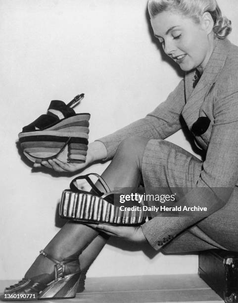 Three heights of Evening and Cocktail Ferragamo Stilt shoes, 3 October 1938. 'The Shoe and Leather Fair opened today at the Royal Agricultural Hall.'...