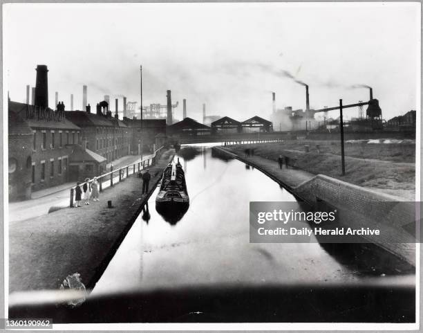 The Potteries, Stoke on Trent, 28th December 1934. View of the canal and homes of the Shelley Pottery Works.