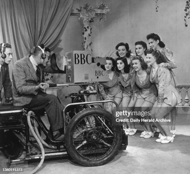 Windmill Girls in front of a BBC television camera, 1946. 'No stage-fright here as the Windmill Girls face the camera like old troupers. The average...