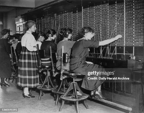 Women working on the switchboard of a telephone exchange, 1923.