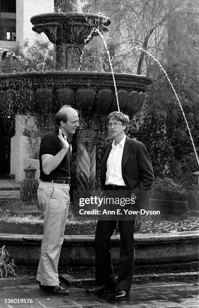 Steve Ballmer and Bill Gates, both from Microsoft, speak next to a fountain at the annual PC Forum, Phoenix, Arizona, February 16-19, 1986.