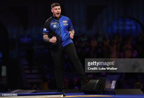 Lewy Williams of Wales reacts during his Round One match against Toyokazu Shibata of Japan during Day Seven of The William Hill World Darts...