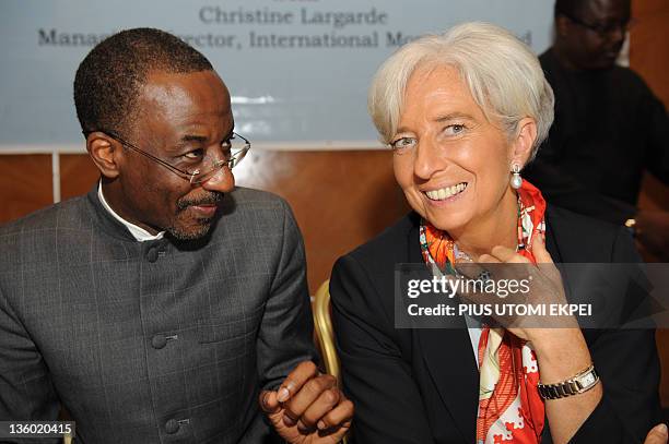 Managing Director Christine Lagarde talks with Nigeria's Central Bank Governor Lamido Sanusi Lamido during a roundtable on "Africa's Future:...