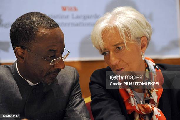 Managing Director Christine Lagarde talks with Nigeria's Central Bank Governor Lamido Sanusi Lamido during a roundtable on "Africa's Future:...