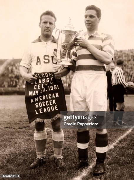 Glasgow Celtic captain John McPhail with his American counterpart prior to the match against the American All Stars soccer team at Triborough Stadium...