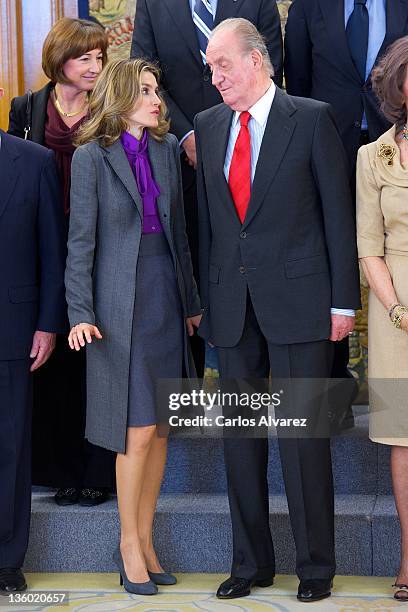 King Juan Carlos of Spain and Princess Letizia of Spain attend several audiences at Zarzuela Palace on December 20, 2011 in Madrid, Spain.