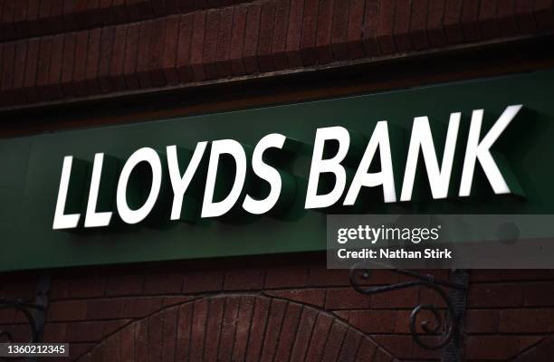 Lloyds Bank logo is displayed outside one of its stores on December 21, 2021 in Newcastle-Under-Lyme, England.