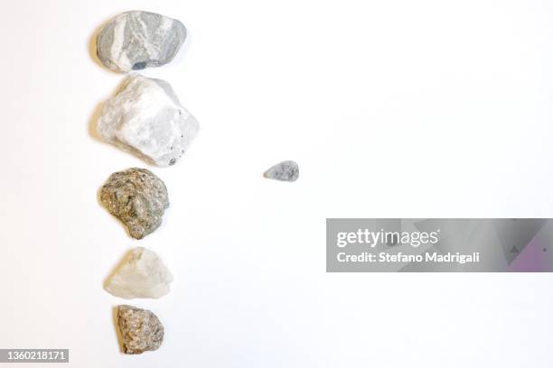 big versus small, metaphor - minirock stock pictures, royalty-free photos & images