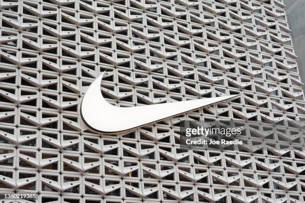 The Nike logo hangs above the entrance to the Nike store on December 21, 2021 in Miami Beach, Florida. Nike reported better-than-expected fiscal...