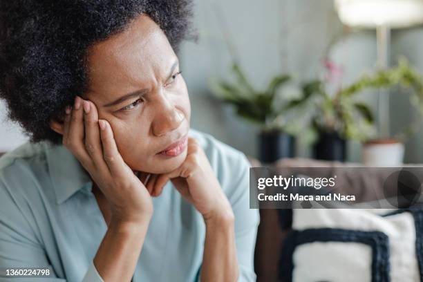 unhappy african-american woman suffering from depression - guilt stock pictures, royalty-free photos & images