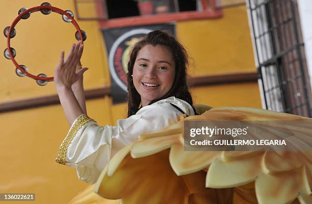 Girl prays the Christmas Novena while recreating a living Nativity scene on December 16 at the Chorro de Quevedo Square in the neighborhood of La...