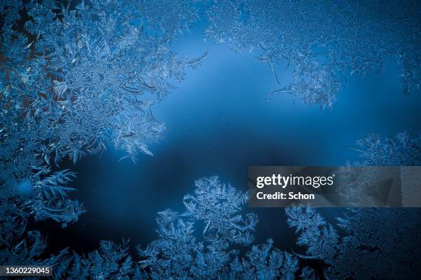 pattern in frost on a glass surface - ice crystal stock pictures, royalty-free photos & images