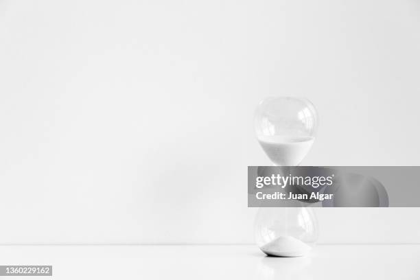 hourglass isolated on white background - hourglass stock pictures, royalty-free photos & images