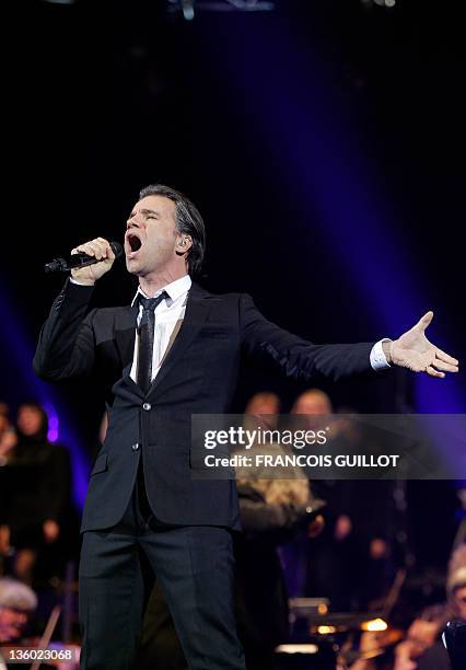 French speaking Canadian singer Bruno Pelletier performs on December 16, 2011 at Bercy hall in Paris during the Notre Dame de Paris musical show by...