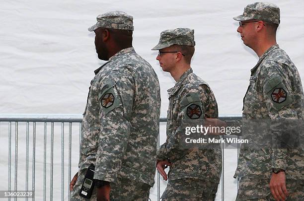 Pfc. Bradley Manning is escorted from his his Article 32 hearing December 16, 2011 in Fort Meade, Maryland. Manning is accused of disclosing more...