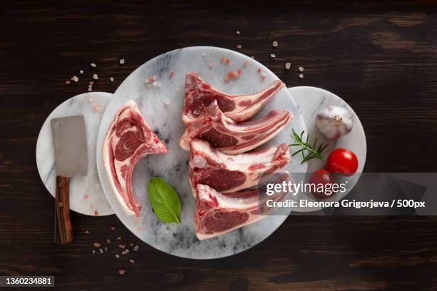 fresh raw lamb on ribs on stone marble kitchen board - halal stock pictures, royalty-free photos & images