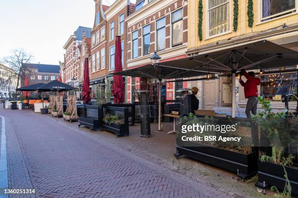 Deserted shopping street is seen on December 21, 2021 in Haarlem, Netherlands. Due to the renewed lockdown, all shops other than grocery stores and...