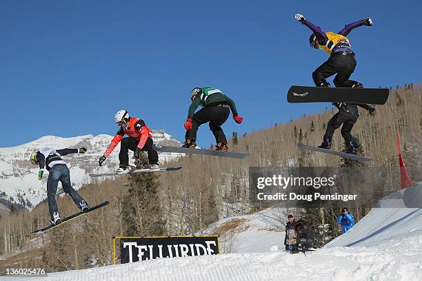 Competitors descend the course during the LG Snowboard-Cross FIS World Cup on December 16, 2011 in Telluride, Colorado.