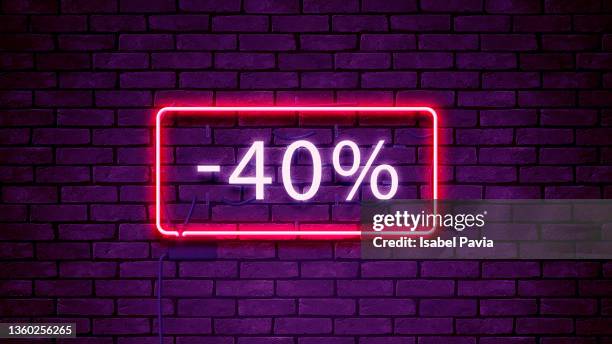 "-40%" message in neon lights - neon numbers stock-fotos und bilder