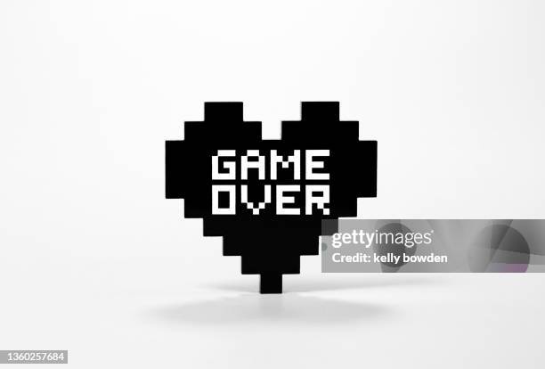 black pixel heart shape game over gaming 8bit end game break up - black and white lovers stock pictures, royalty-free photos & images