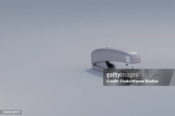 grey manual office stapler - staples office stockfoto's en -beelden