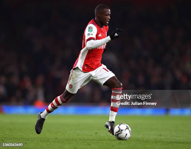 Nicolas Pepe of Arsenal in action during the Carabao Cup Quarter Final match between Arsenal and Sunderland at Emirates Stadium on December 21, 2021...