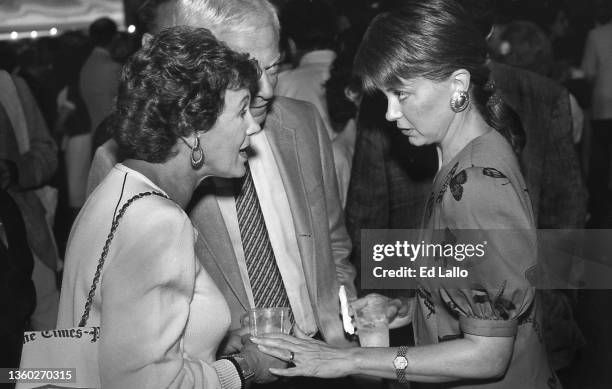 American broadcast journalist Jane Pauley speaks with an unidentified couple during the 1988 Republican National Convention, New Orleans, Louisiana,...