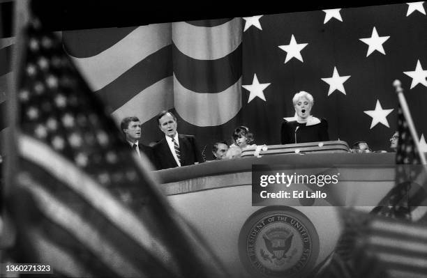 As American politicians Dan Quayle and George HW Bush watch as actress & singer Shirley Jones performs during the 1988 Republican National...