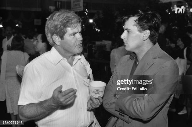 American politician US Representative Newt Gingrich speaks with an unidentified man during the 1988 Republican National Convention, New Orleans,...