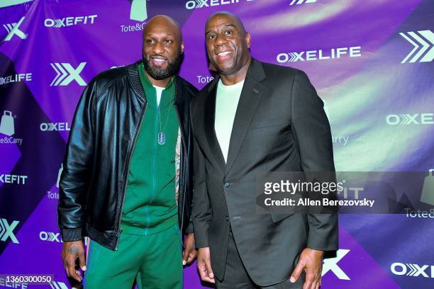 Lamar Odom and Magic Johnson attend OxeFit Mixer at the LA Lakers vs. Phoenix Suns NBA Game hosted by Magic Johnson and DJ D-Nice at Crypto.com Arena...