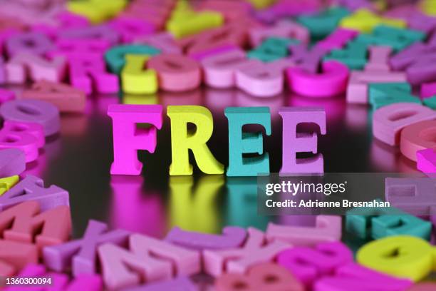 colorful craft letters spelling “free” - gratis stock pictures, royalty-free photos & images