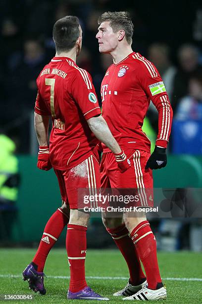 Toni Kroos of Bayern celebrates the first goal with Franck Ribery of Bayern during the DFB Cup round of sixteen match between VfL Bochum and FC...