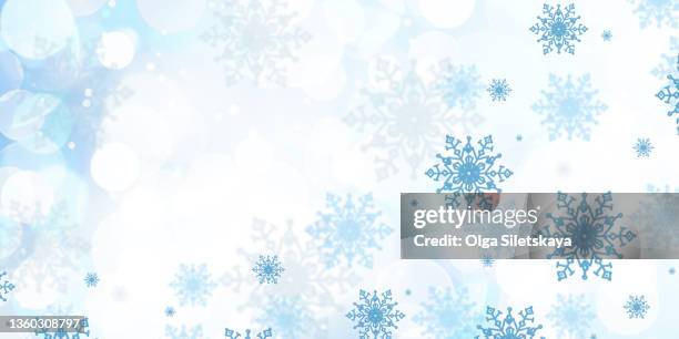 snowflakes on blue background - snow flakes stock pictures, royalty-free photos & images