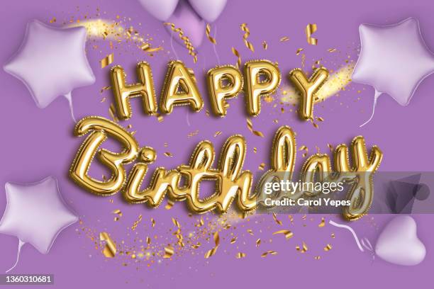 happy birthday in golden balloon with glitter confetti purple background - silver balloon imagens e fotografias de stock