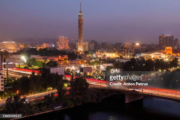 beautiful view of cairo and the nile at dusk. egypt - cairo cityscape stock pictures, royalty-free photos & images