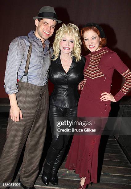 Dolly Parton poses backstage with cast members Jeremy Jordan and Laura Osnes at the musical "Bonnie and Clyde" on Broadway at The Gerald Schoenfeld...