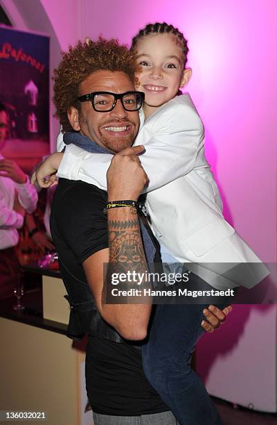 Rufus Martin and his son Noah attend the ABC For Kids Charity Event at the baSH Club on December 16, 2011 in Munich, Germany.