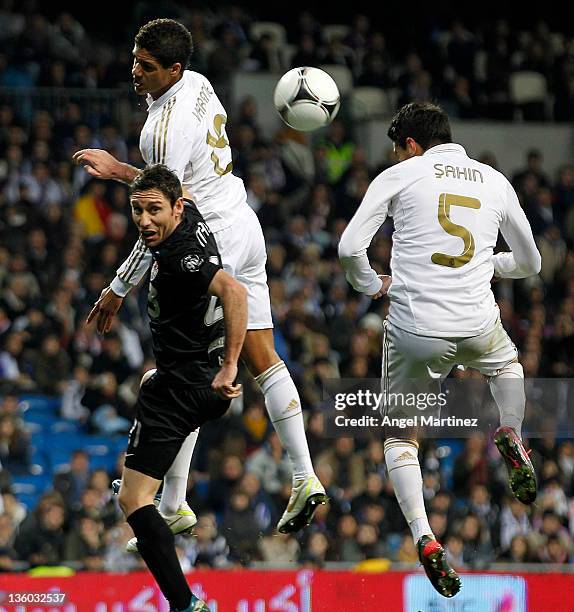 Nuri Sahin of Real Madrid heads the ball to score Real's second goal during the round of last 16 Copa del Rey second leg match between Real Madrid...