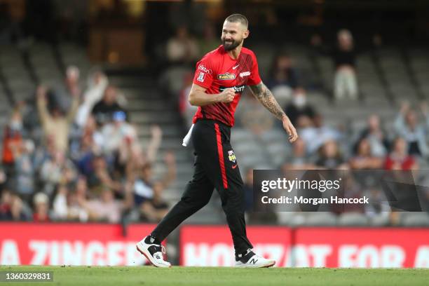 Kane Richardson of the Renegades celebrates the wicket of Mitchell Marsh of the Scorchers during the Men's Big Bash League match between the...