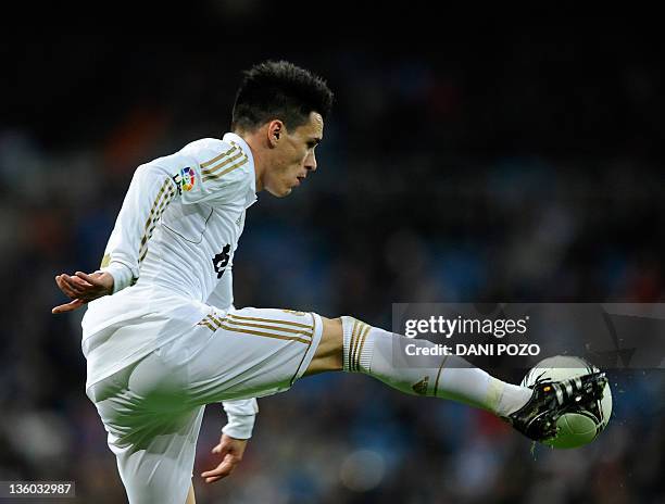 Real Madrid's forward Jose Callejon controls the ball during the Spanish King's Cup football match Real Madrid CF vs Ponferradina on December 20,...