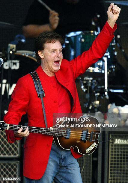 Ex-Beatle Sir Paul McCartney performs at his first ever concert in Russia in Red square, Moscow 24 May 2003 during his 'Back in the World 2003' Tour....