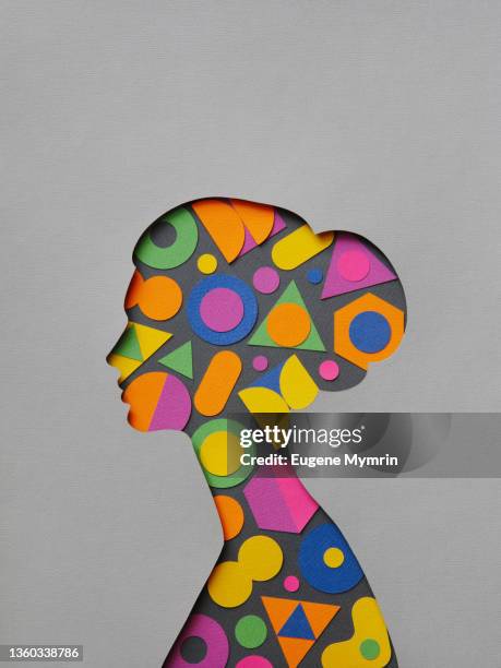 paper head silhouette with geometric shapes - information overload - fotografias e filmes do acervo