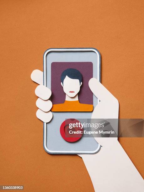 female using a dating app on smart phone - zoom app stock pictures, royalty-free photos & images