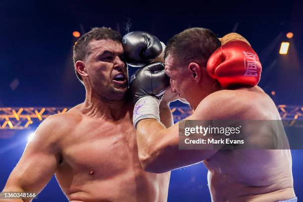 Paul Gallen and Darcy Lussick fight during their Footy Fight Night Christmas Bash heavyweight bout at The Star on December 22, 2021 in Sydney,...